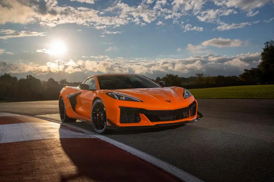 Front view of 2023 Chevrolet Corvette Z06 in Amplify Orange Tint on a track. Image Courtesy: Chevrolet