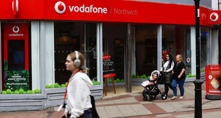 Britain approves $19bln Vodafone-Three mobile merger