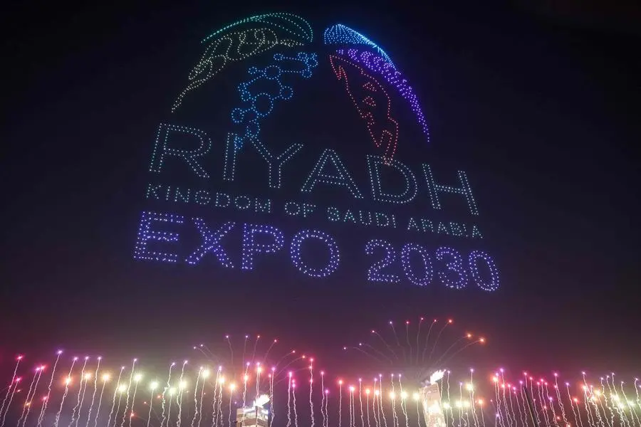 A light display created using drones is performed after Riyadh won the right to host the 2030 World Expo at king Abdullah Financial District in Riyadh, on November 28, 2023. With a pledge for an Expo \\\"built by the world for the world\\\", Saudi's bid smashed the opposition after a years-long lobbying campaign whose intensity caused some gnashing of teeth among its Italian rivals. (Photo by Fayez NURELDINE / AFP)