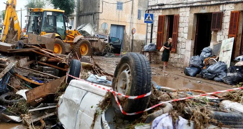 Heavy rains turn streets into rivers on Spain's Mediterranean coast