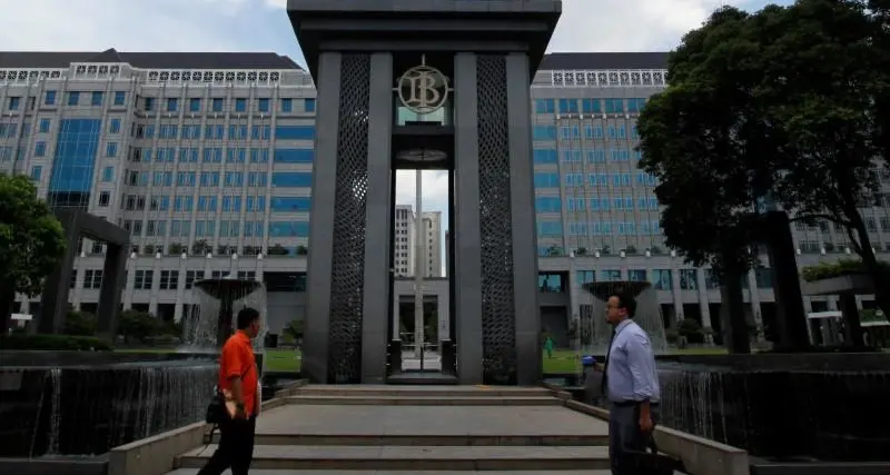 Indonesia central bank vows to reverse rupiah losses, holds interest rates