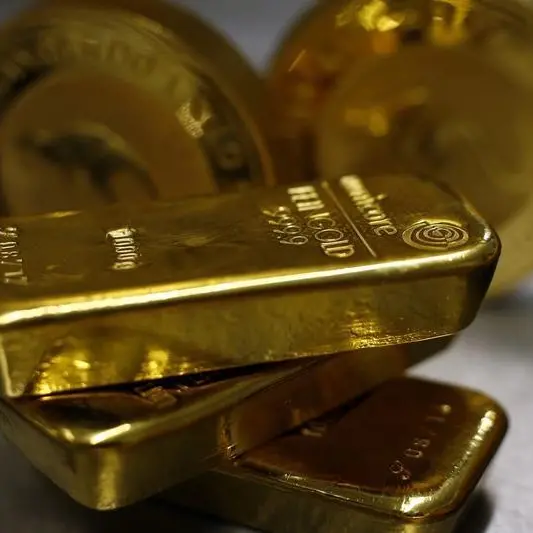 Gold holds ground on US rate cut hopes