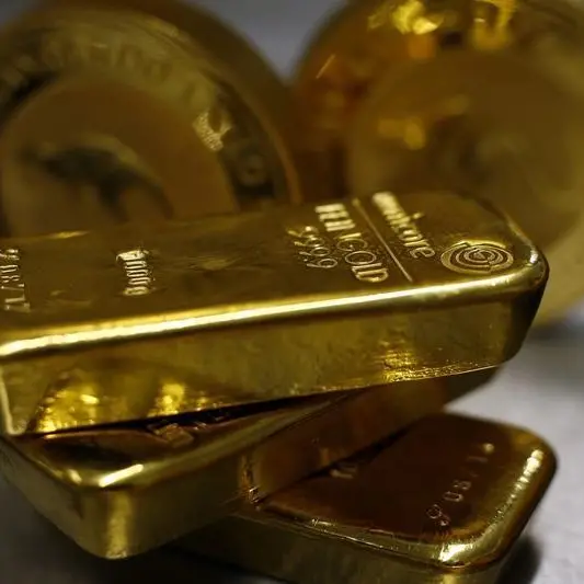 Gold rises as dollar softens, traders brace for Fed rate cut