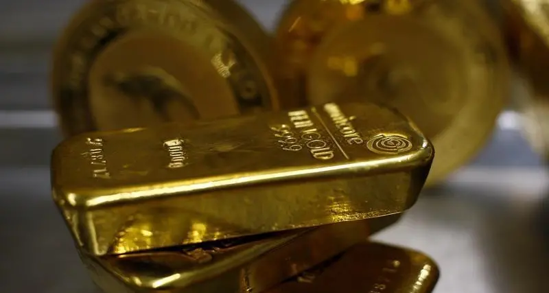 Gold rises as dollar softens, traders brace for Fed rate cut