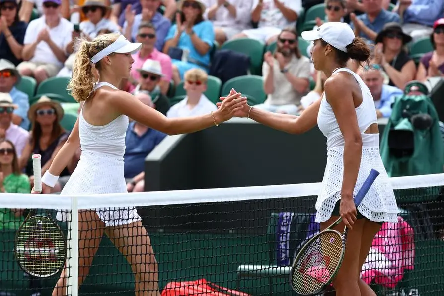 Tennis - Wimbledon - All England Lawn Tennis and Croquet Club, London, Britain - July 10, 2023 Madison Keys of the U.S. shakes hands with Russia\\'s Mirra Andreeva after winning their fourth round match REUTERS/Toby Melville , Reuters/REUTERS