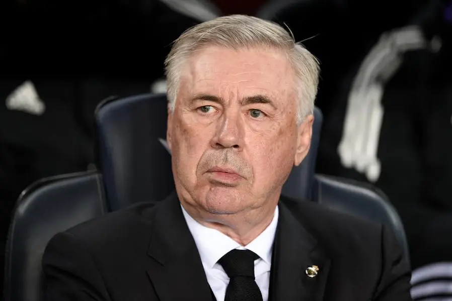 Real Madrid\\'s Italian coach Carlo Ancelotti looks on before the start of the Spanish league football match between FC Barcelona and Real Madrid CF at the Camp Nou stadium in Barcelona on March 19, 2023. (Photo by Josep LAGO / AFP)