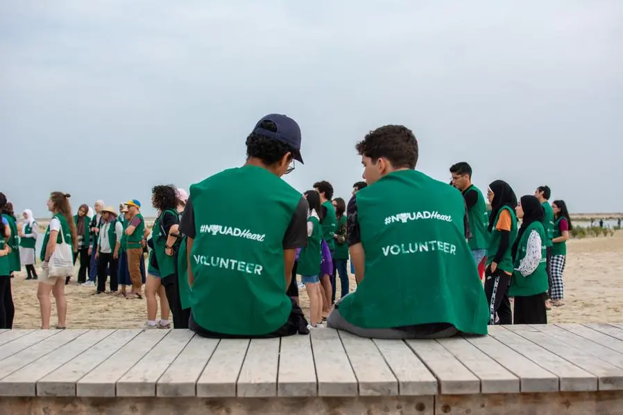 More than 100 NYU Abu Dhabi (NYUAD) community members gathered at one of the UAE\\u2019s unique ecosystems near Jebel Ali to plant 5,000 mangrove trees. Image Courtesy: NYU Abu Dhabi