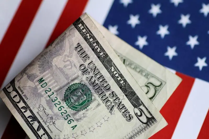 A U.S. five dollar note is seen in this illustration photo June 1, 2017. Thomas White/Illustration, Reuters , Reuters Images