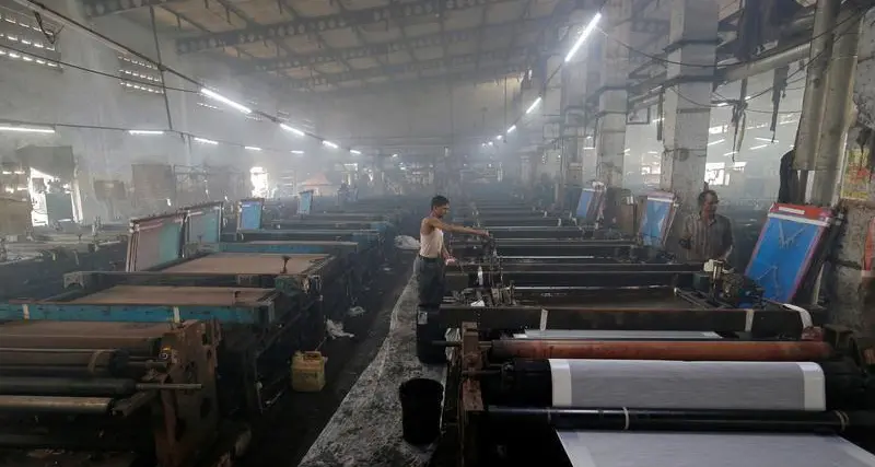 India's March factory growth hits 16-year high, hiring picks up