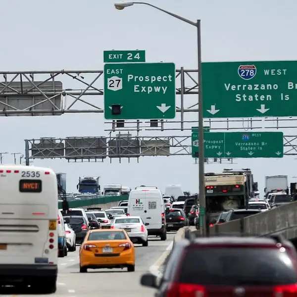 Americans look past fuel cost, bad weather to set July Fourth travel record