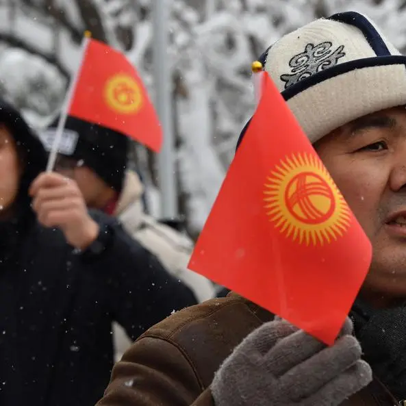 Kyrgyzstan backs new flag, says 'smiling' sun to aid growth