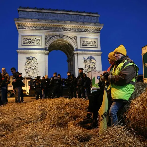 French farmers protest near Paris's Arc de Triomphe