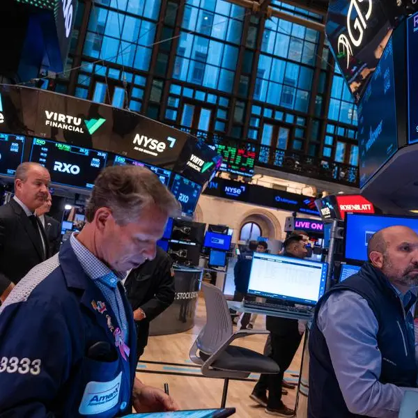 Stock markets mostly fall, oil jumps as China cuts rates