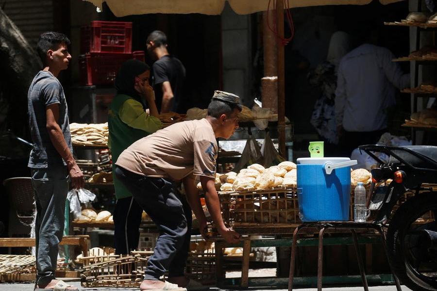 Egyptians struggle with first bread subsidy cut in decades
