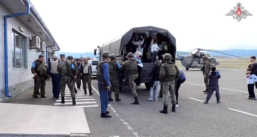 Russian peacekeeper vehicles seen heading towards Karabakh - Reuters reporter