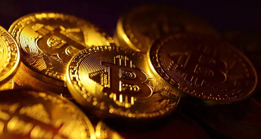 Bitcoin hits record above $72,000 as demand frenzy intensifies