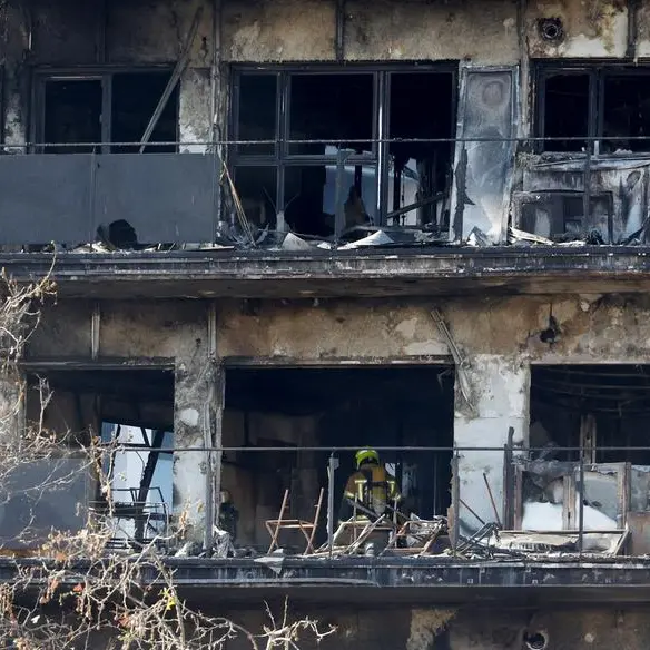Spain building fire kills three, including child