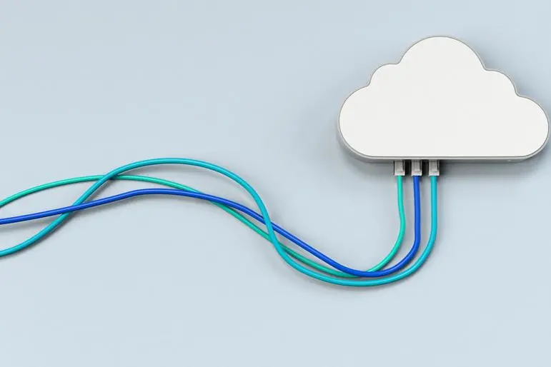 Cloud shaped computer hard drive with three cables coming out of it, on a blue background. Image used for illustrative purpose. Getty Images , Getty Images