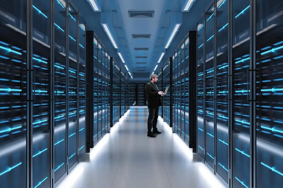 Man working on laptop in server room. Image used for illustrative purpose. Getty Images , Getty Images/Getty Images