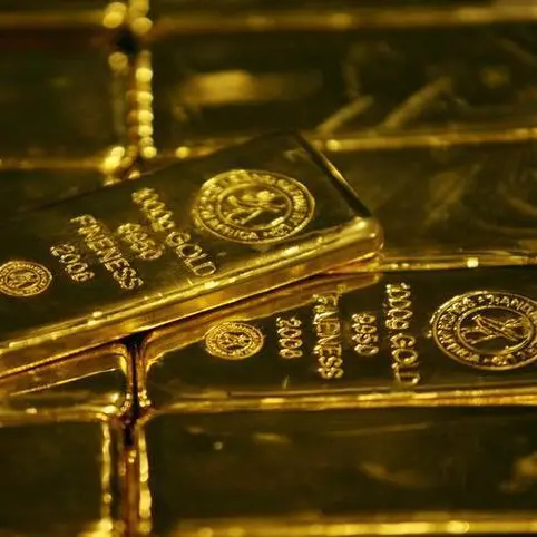 Gold prices flutter higher as Fed holds rates steady