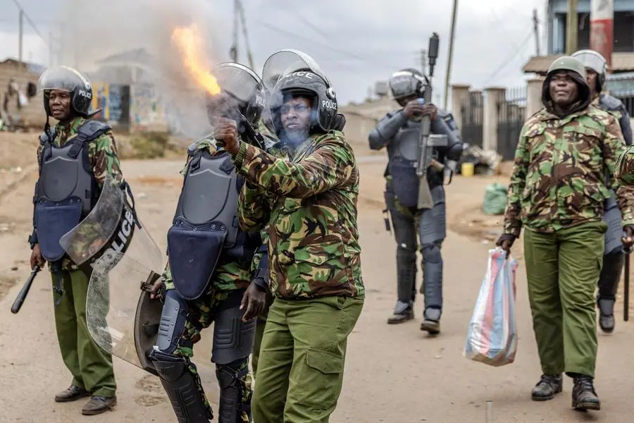 Kenya police fire tear gas as protesters defy ban