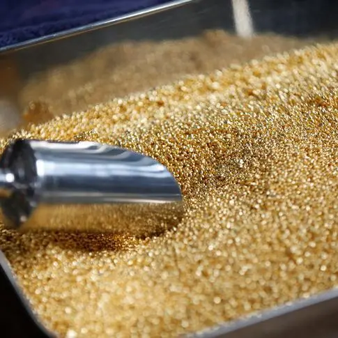 Gold slips as dollar ticks higher, US inflation report in focus