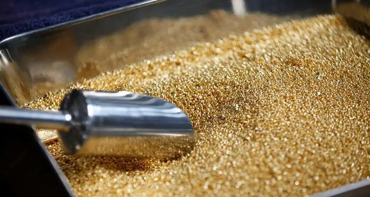 Gold slips as dollar ticks higher, US inflation report in focus