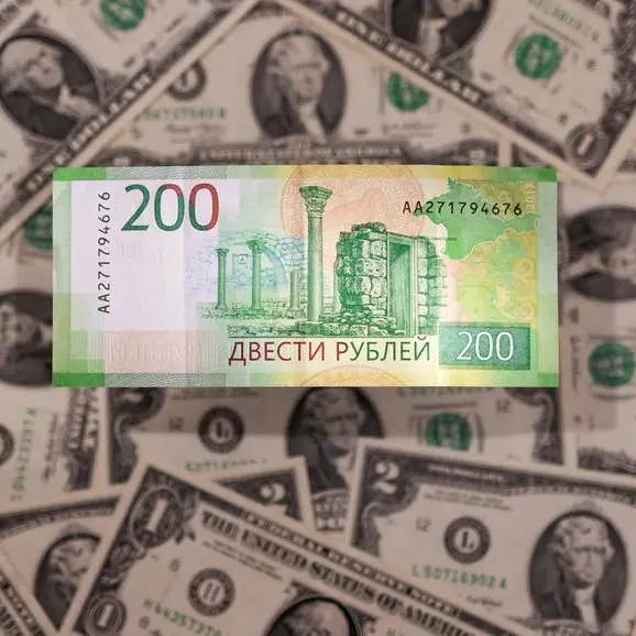 Russian rouble slightly weakens against US dollar