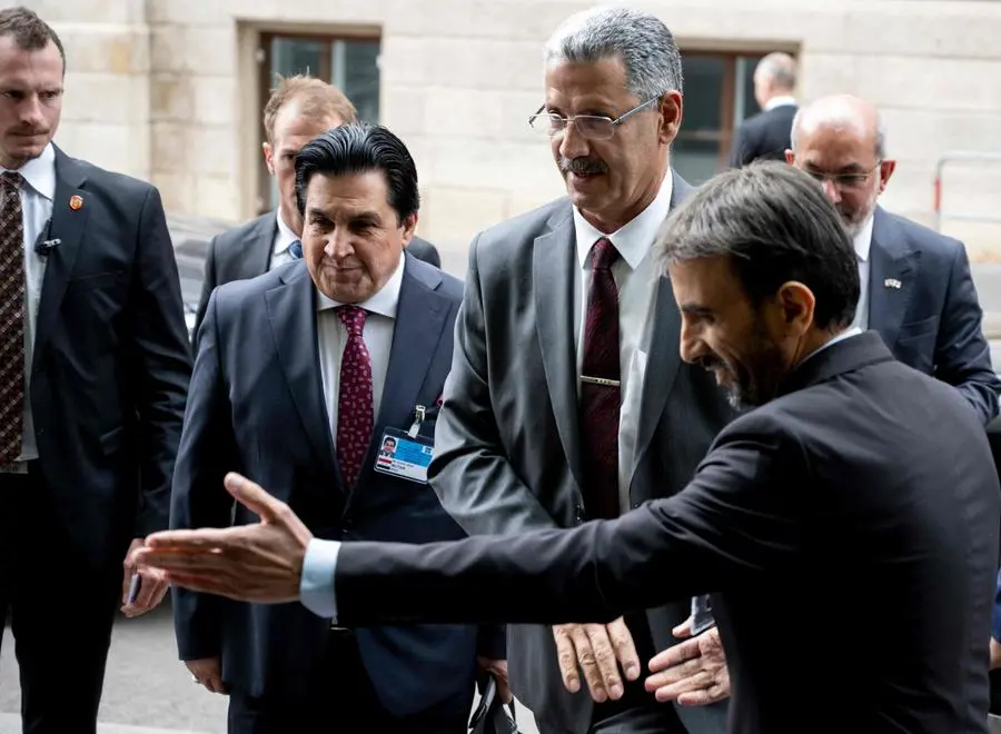 Iraq's Deputy Prime Minister for Energy Affairs and Minister of Oil Hayan Abdulaghani Abdulzahra Alsawa (2nd right) arrives for the 35th OPEC (Organization OF Petroleum Exporting Countries) and non-OPEC ministerial meeting in Vienna, Austria, on June 4, 2023. There are growing signs that major oil producers led by Saudi Arabia and Russia are considering slashing production further when they meet on in a bid to prop up prices. (Photo by JOE KLAMAR / AFP)