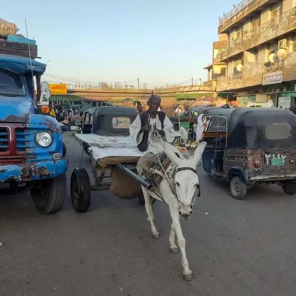 War-weary Sudanese without fuel turn to donkey carts
