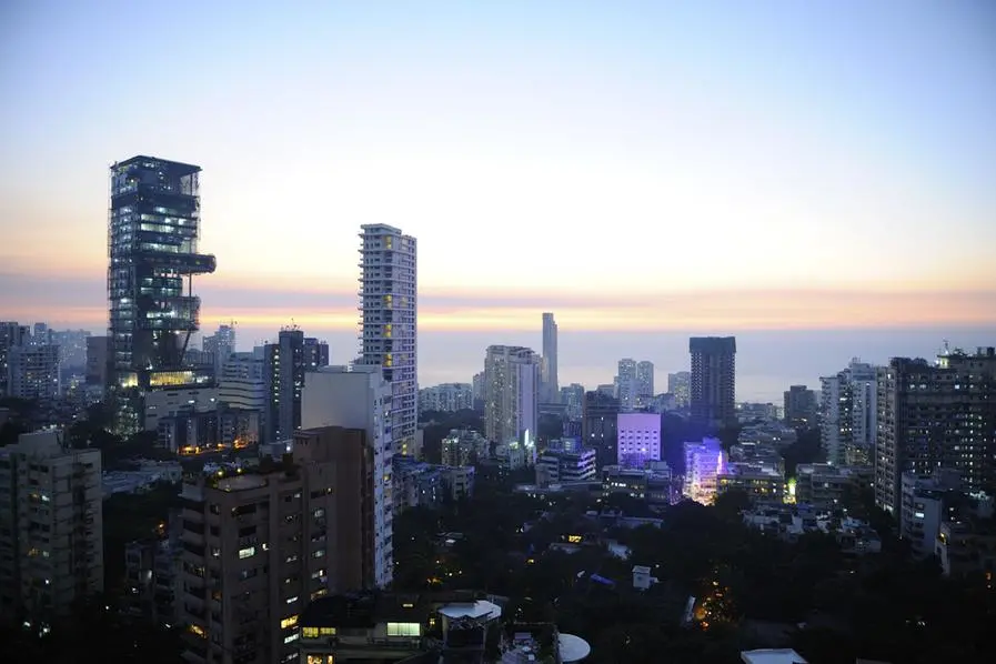 The Antilia building (L), owned by Indian businessman Mukesh Ambani, is one of the world\\'s largest private homes. Image used for illustrative purpose. Getty Images , Getty Images