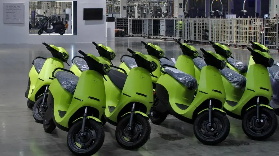 SoftBank-backed Ola Electric suspends India car project to focus on scooters, bikes, sources say