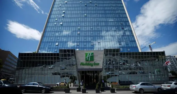Holiday Inn owner IHG's reports surprise third-quarter room revenue growth