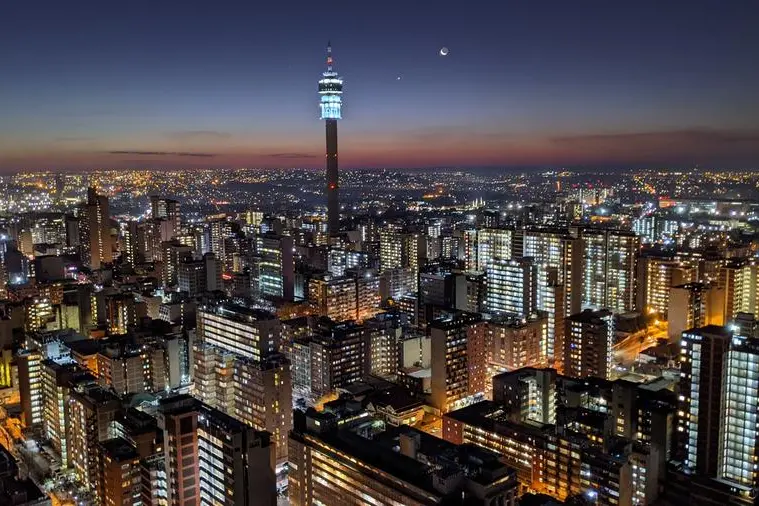 Johannesburg City Skyline. Aerial View Of Illuminated Buildings In City At Night. - stock photo Photo taken in Johannesburg, South Africa. Image Courtesy: Getty Images Image for illustrative purpose. , Getty Images/EyeEm