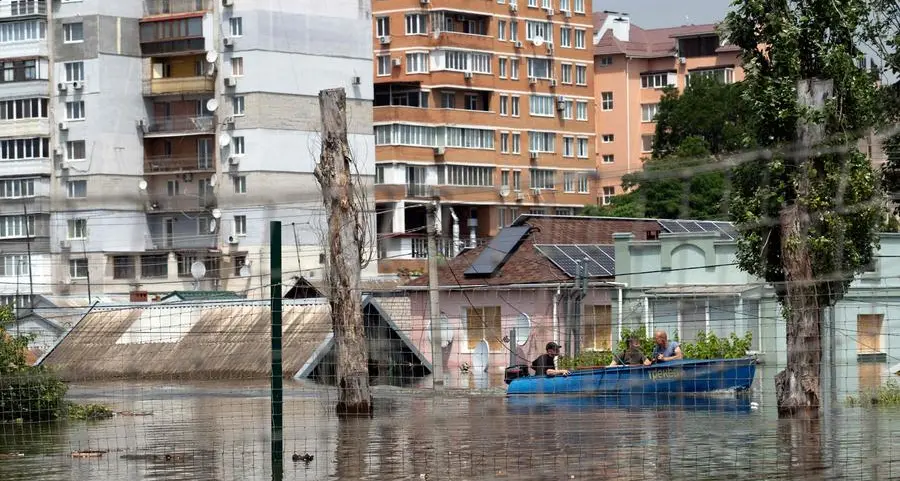 Ukraine reports deaths in Russian shelling of flood-hit Kherson