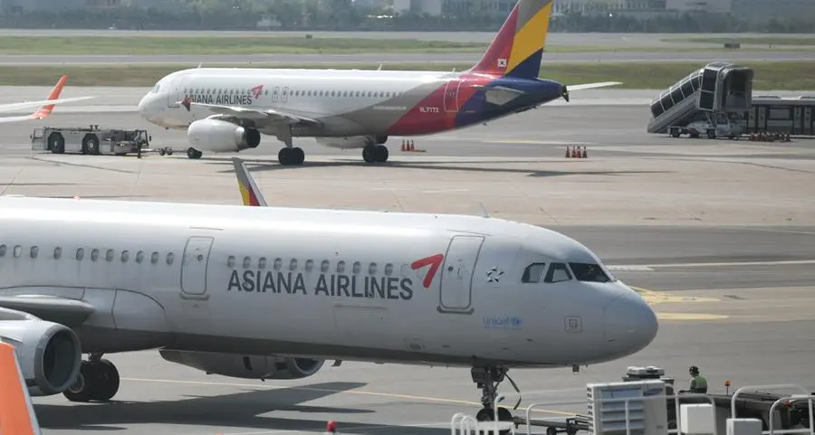 Asiana Airlines bans some emergency seats after door-opening accident