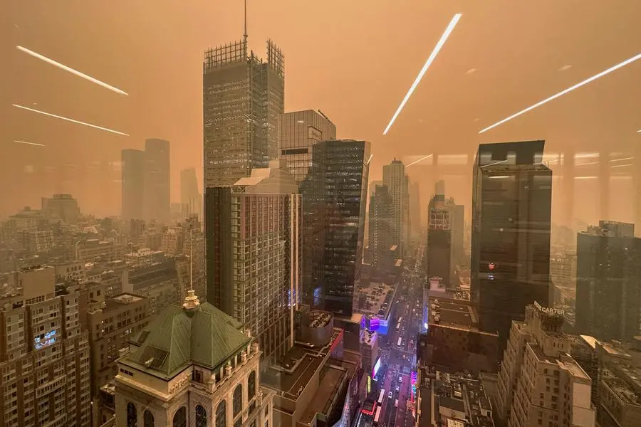 Skylines vanish behind Canada wildfire smoke