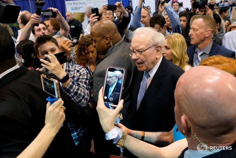 Buffetts Berkshire posts 355bln profit buys back more stock Buffetts Berkshire posts 355bln profit buys back more stock