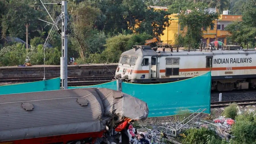 Trains cross site of Indian rail disaster as services resume