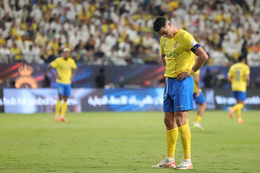 Nassr\\'s Portuguese forward #07 Cristiano Ronaldo reacts during the Saudi Pro League football match between Al-Nassr and Abha at the King Saud University Stadium in Riyadh on October 6, 2023. (Photo by Fayez Nureldine / AFP) , Agence France-Presse (AFP)