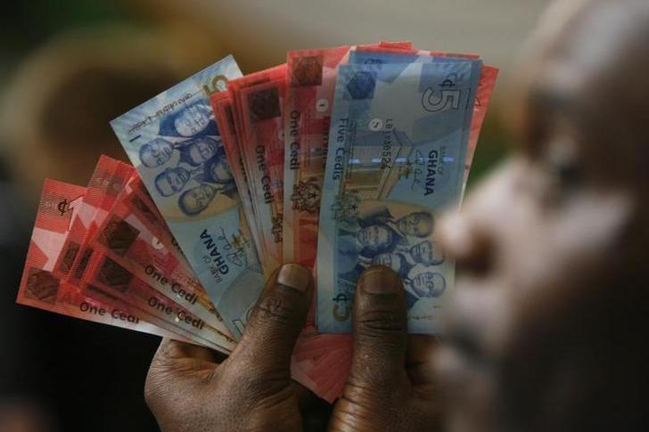 Ghana's currency under pressure, others broadly steady