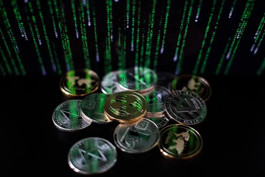 In this photo illustration of the litecoin, ripple and ethereum cryptocurrency \\'altcoins\\' sit arranged for a photograph on April 25, 2018 in London, England. (Photo by Jack Taylor/Getty Images) Image used for illustrative purpose. , Getty Images