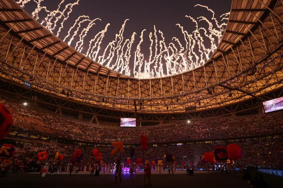 Dancers perform during the closing ceremony ahead of the Qatar 2022 World Cup final football match between Argentina and France at Lusail Stadium in Lusail, north of Doha on December 18, 2022. (Photo by Adrian DENNIS / AFP)