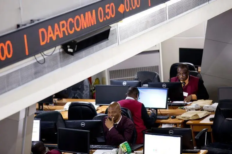 Traders work at the Nigerian Stock Exchange in Lagos, February 13, 2015.REUTERS/Joe Penney. Image used for illustrative purpose only. , Reuters Images