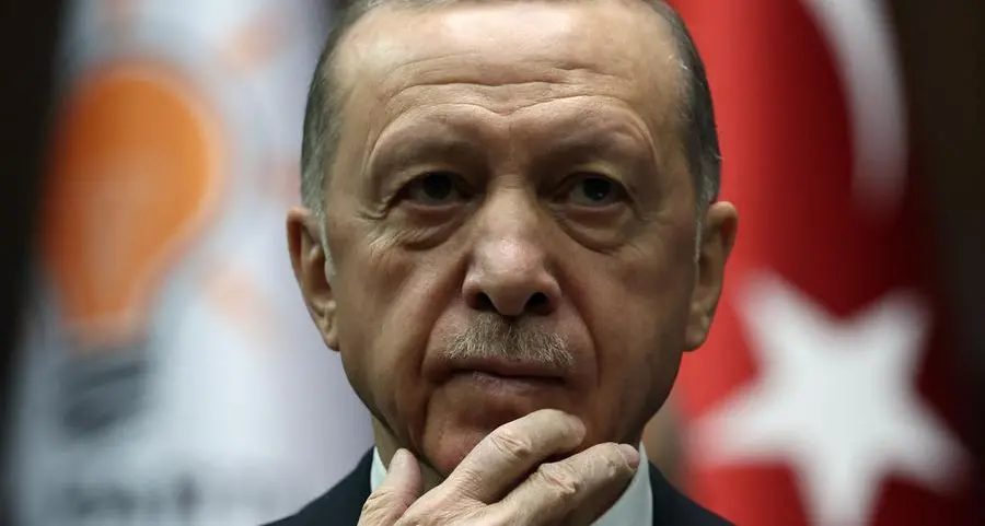 Ailing Erdogan tries to project health by video link