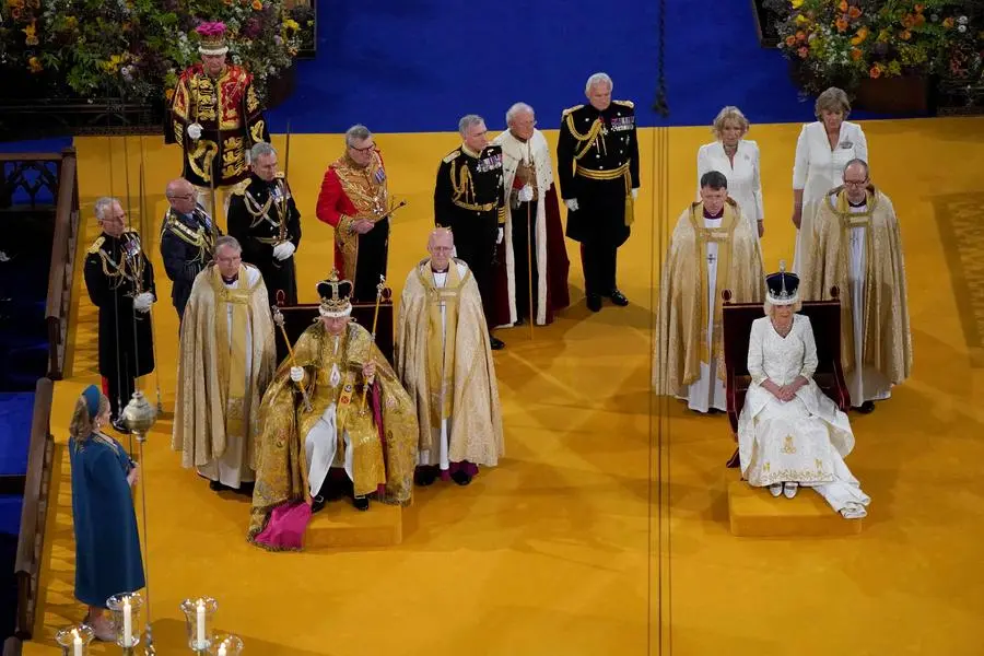 King Charles III wearing the St Edward's Crown and Queen Camilla wearing the Queen Mary's Crown during their coronation ceremony in Westminster Abbey, London. Picture date: Saturday May 6, 2023.  Andrew Matthews/Pool via REUTERS