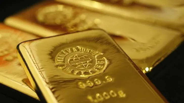 Gold ticks lower, markets digest tariff developments