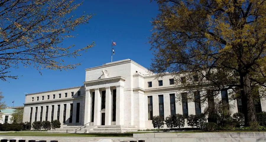 Bond investors warm to risk, with Fed staying put in 'Goldilocks' economy
