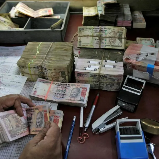 Indian rupee edges down pressured by weaker Asian peers, high oil prices
