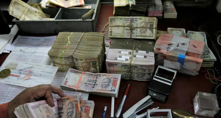 Indian rupee ends slightly higher on day, little changed on month